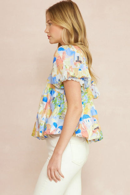 Print round neck puff sleeve peplum top featuring bubble hem